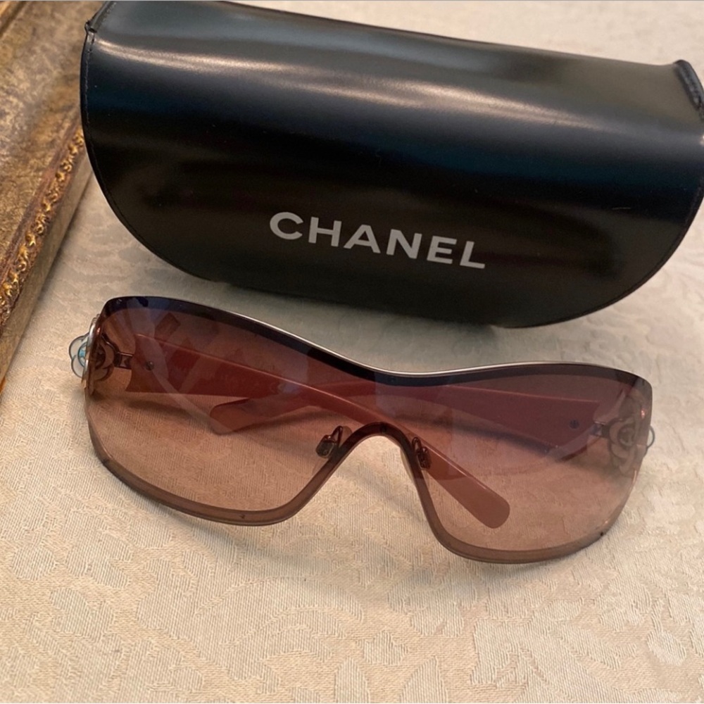 Chanel authentic floral sunglasses with case. No longer available.